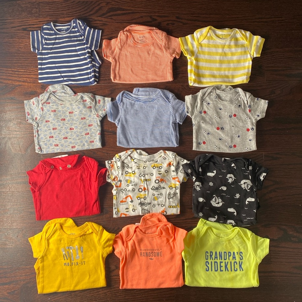 12 short sleeve Carter’s onesies